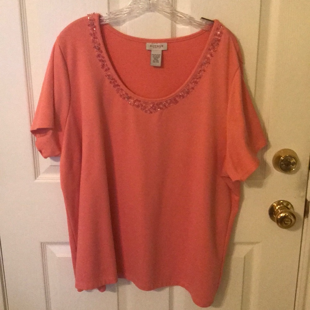 Peach colored top. Plus size.
